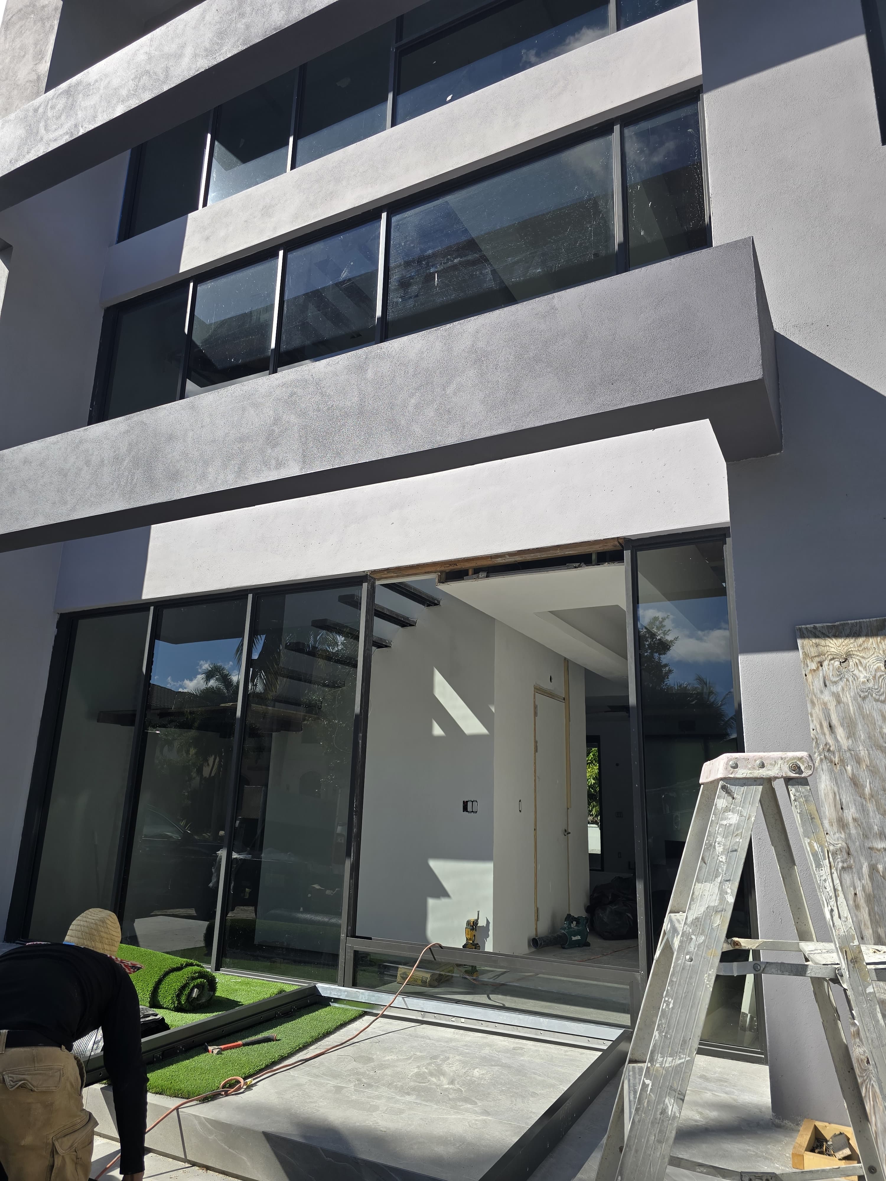 Commercial storefront impact glass installation